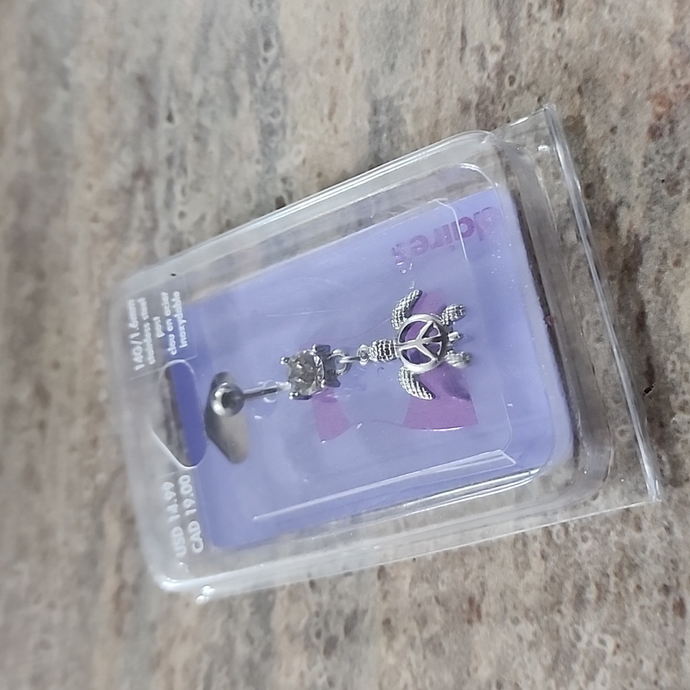Turtle belly button piercing